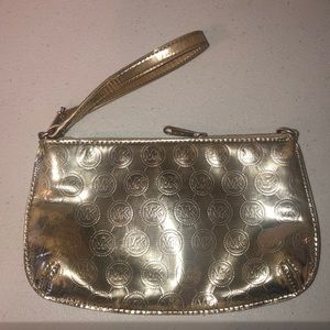 Michael Kors gold wristlet great condition